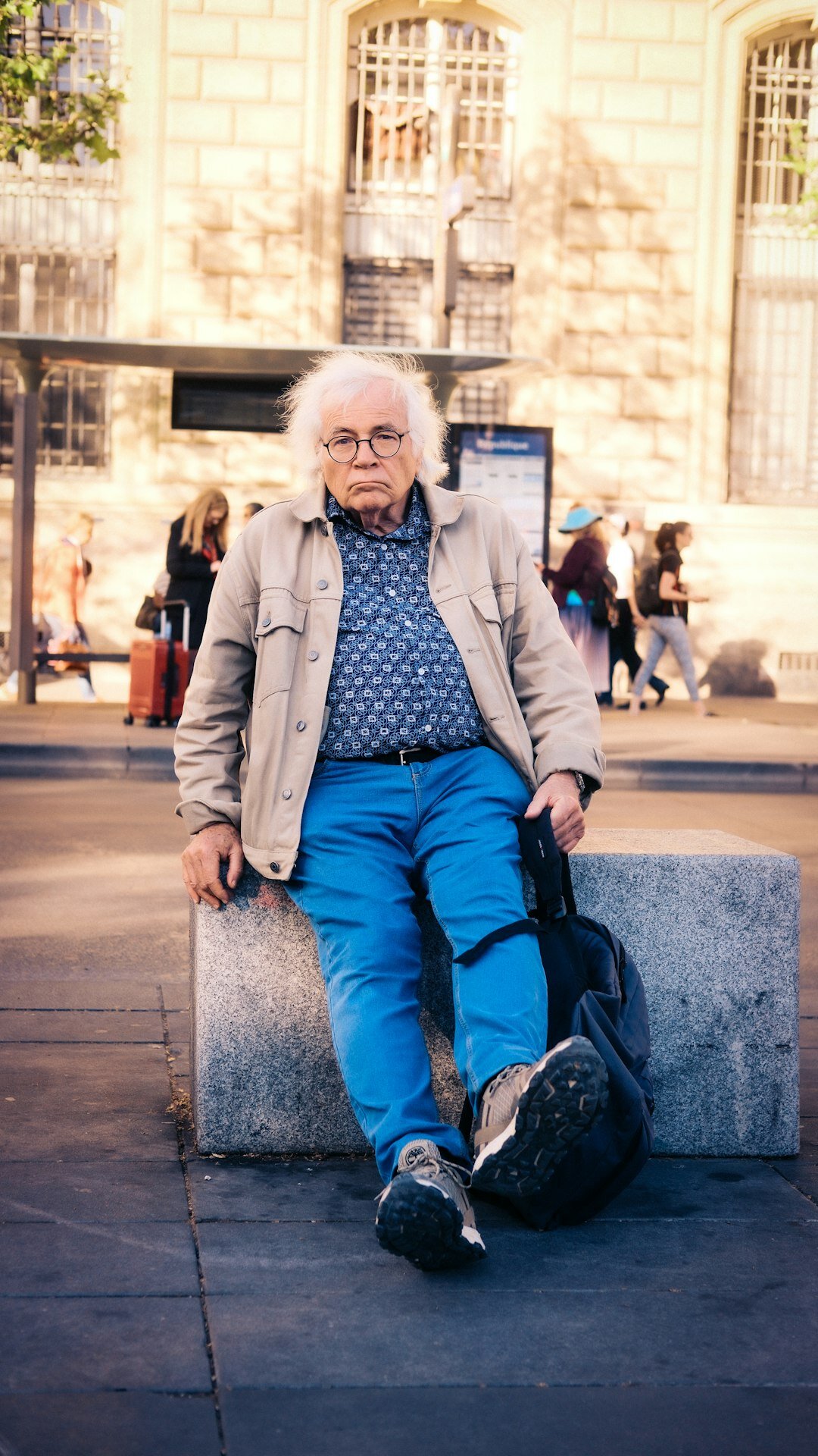 senior traveler with suitcase